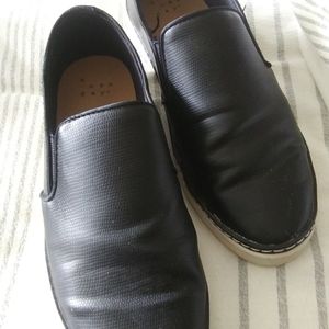 Black slip-on sneakers
